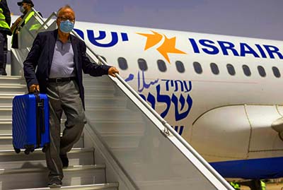 An Israeli tourist leaves the airplane